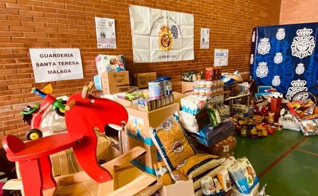 Malaga police donate over 2.5 tonnes of food and toys for children in need at Christmas