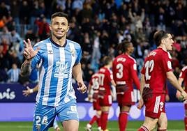 Record-breaking Rubén Castro celebrates one of his two goals on Monday night.