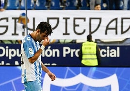 Malaga's Alberto Escassi following the defeat.