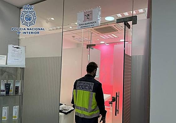 Police raid the premises of the cosmetic surgery clinic.