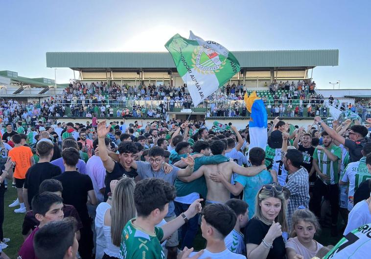 Antequera fans celebrating their team's win.