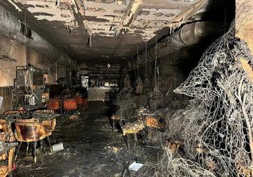 Investigations continue after flambéed pizza sparks fire in Madrid restaurant that left two people dead