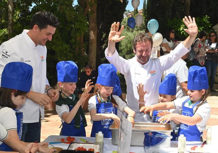 About 150 children cooked with some of Spain's top chefs.