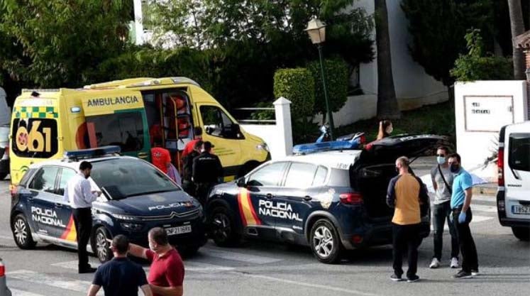 Police investigators at the scene of the incident.