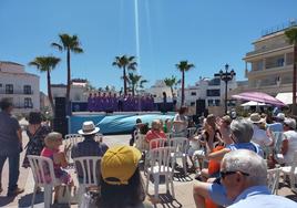 Participants at Residents' Day watch one of the performances