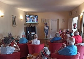 RBL members enjoy coverage of the coronation on television..