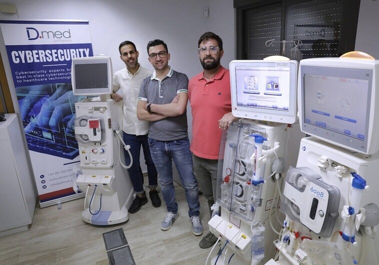 Alessando Vitiello (centre) with two members of the D.med Software team next to the dialysis machines for which they develop cybersecurity and connectivity solutions.