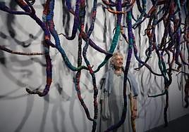 Sheila Hicks, with one of her works.