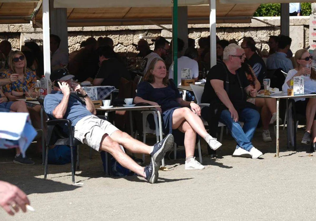 Tourists on a Costa del Sol bar terrace.