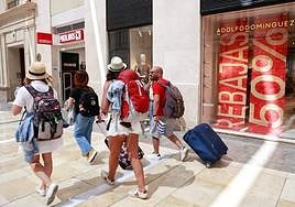 The first sales posters of the season are already up on Malaga's Calle Larios.