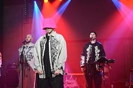 Rapper Oleh Psiuk in his pink hat; vocalist Timofii Muzychuk is on the right.