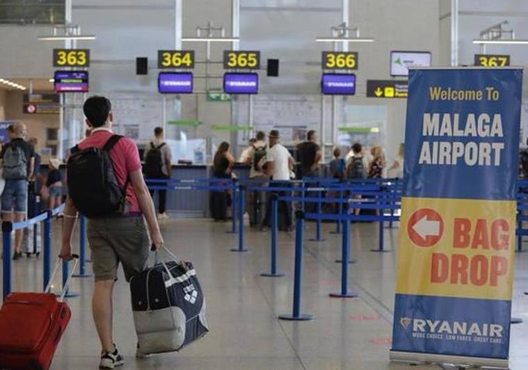 Why is Malaga Airport is known by the international code AGP?