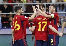Spain captain Abel Ruiz, right, celebrates his goal.