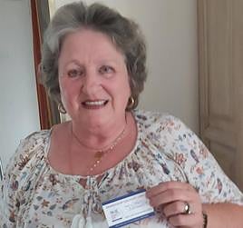 President Carol Woolnoth with one of the cards.