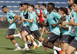Malaga players are put through their paces on the first day of pre-season.