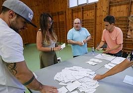 Votes being counted at a polling station.