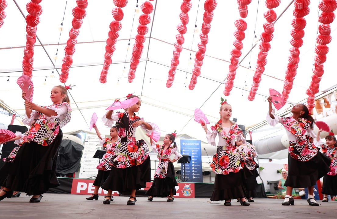 Tuesday's best images of Malaga's spectacular summer fair