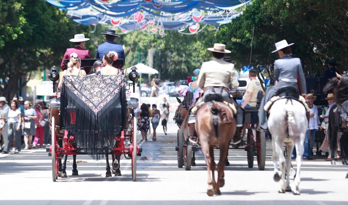 Tuesday's best images of Malaga's spectacular summer fair
