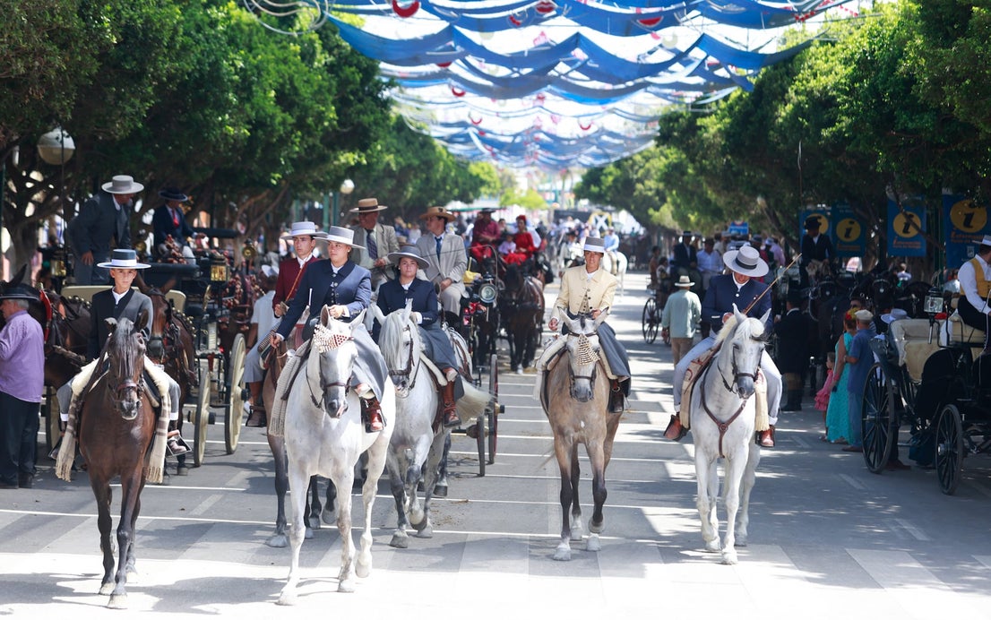 Tuesday's best images of Malaga's spectacular summer fair