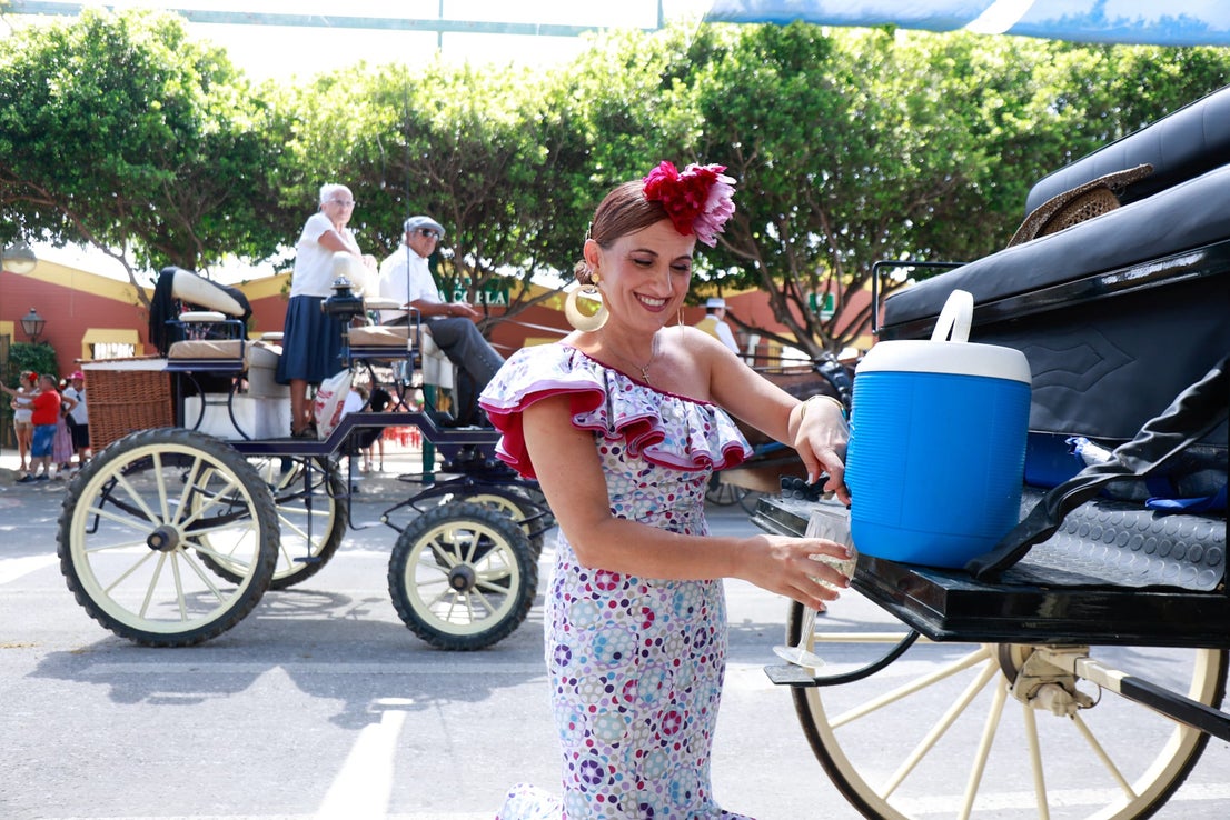 Tuesday's best images of Malaga's spectacular summer fair