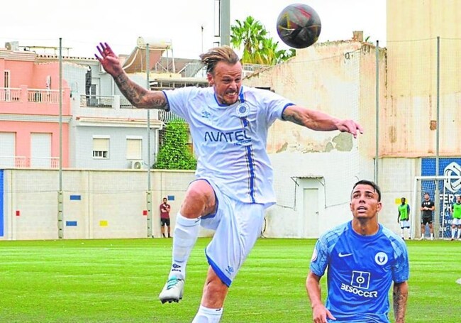 Action from El Palo's draw with Vélez.