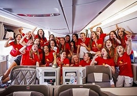 The world champions celebrating their win in Australia on the plane on the way back to Spain.