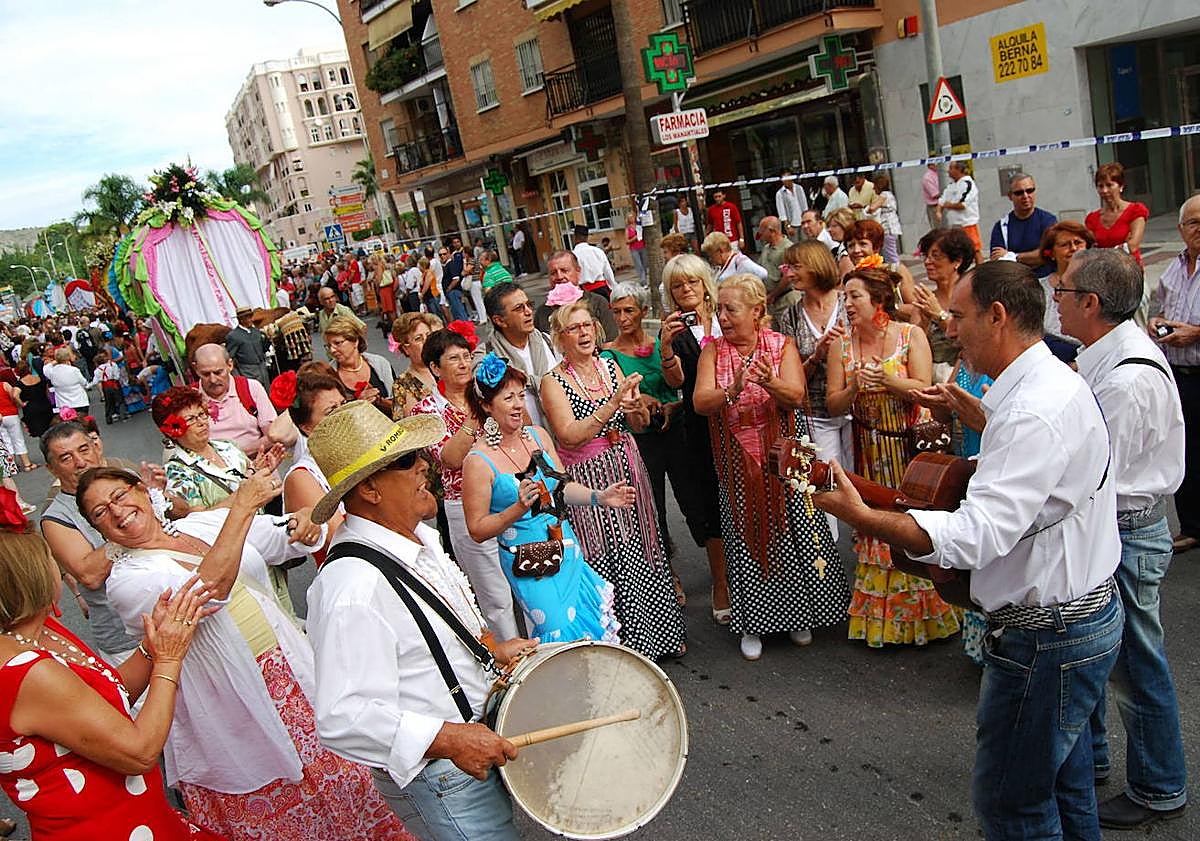 Imagen principal - Images from a previous San Miguel romería in Torremolinos.