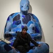 Ela Fidalgo, sitting on the iconic 'Gordita' that opens the exhibition.