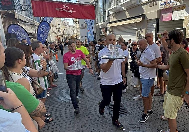 Watch as Costa del Sol waiters get competitive and put on a sprint