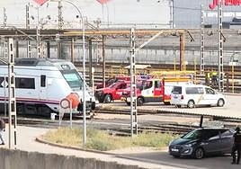 Emergency services at the scene after the young man's body was spotted by a camera crew on live television.