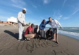 Some of the migrants on the beach this week, close to where they are staying in Torrox.