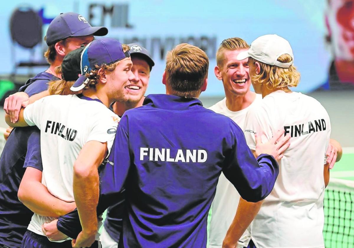 The Finland team celebrate their qualification for the finals of the Davis Cup.
