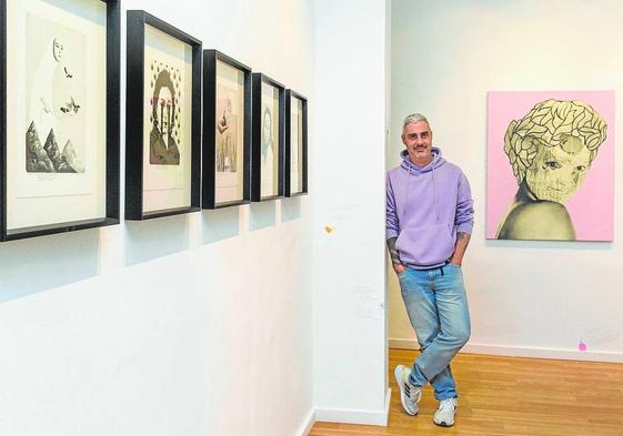Artist Emmanuel Lafont with some of his works in the exhibition.