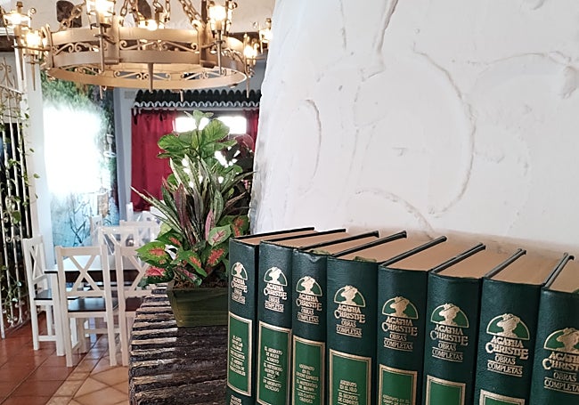 A collection of Agatha Christie books in the restaurant.