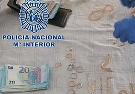 Part of the jewellery and cash haul seized by the National Police.