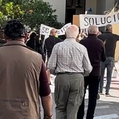 La Viñuela residents who have receieved high water bills protested outside the town hall on Monday to demand a solution