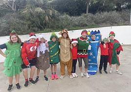 Jojo and children in training for the burpee challenge.