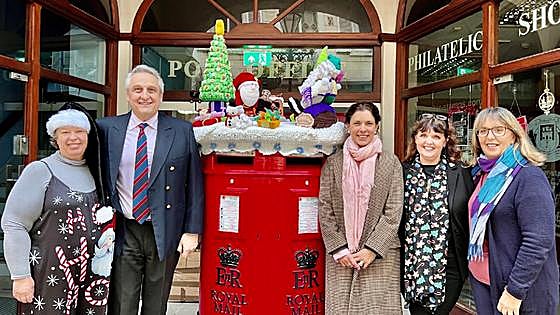 Gibraltar post box gets Christmas topper with a dementia theme