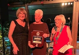 Karen Frost accepts her Melvin Jones Fellowship Award.