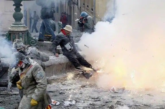 A battle during the 'Festa dels Enfarinats' in Ibi, Alicante.