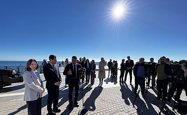 The president of the Junta de Andalucía with authorities in Nerja on Wednesday.