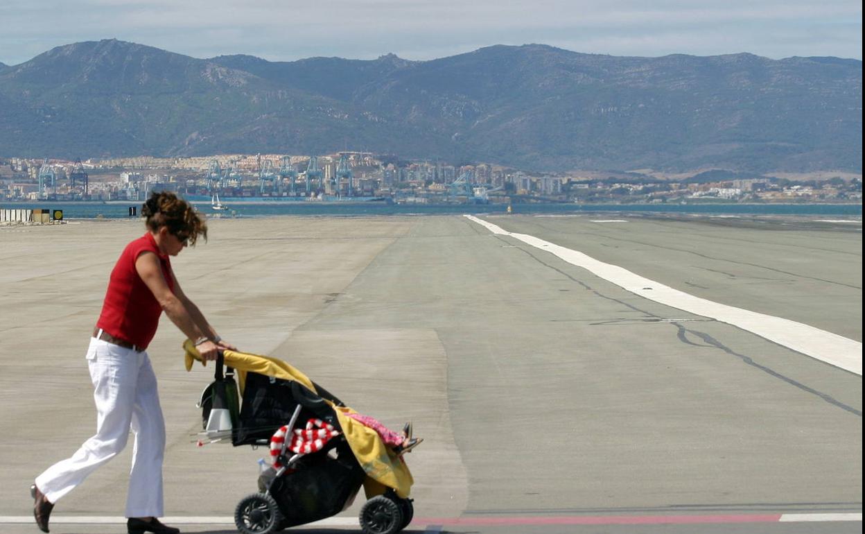 Crossing the Gibraltar runway on foot. 