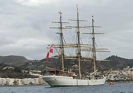 The elegant Danmark in the bay of La Herradura.