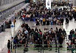 File image of the airport's flight check-in desks.