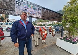 Antonio poses with his donkeys, dressed in the new uniform.