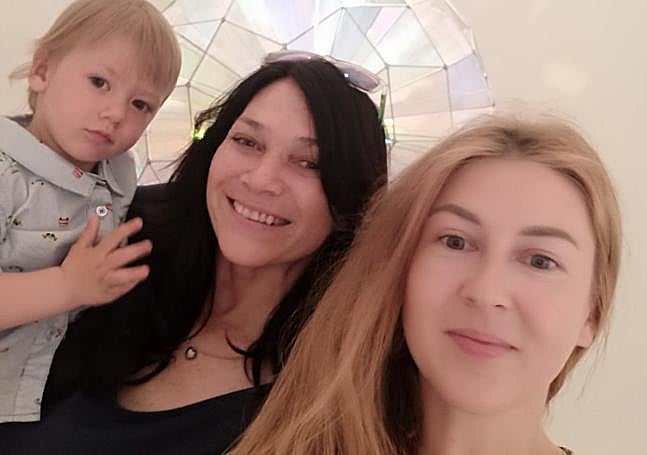 Olga (r) with Artem and Oksana.