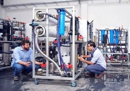 Boreal Light employees building a portable desalination plant