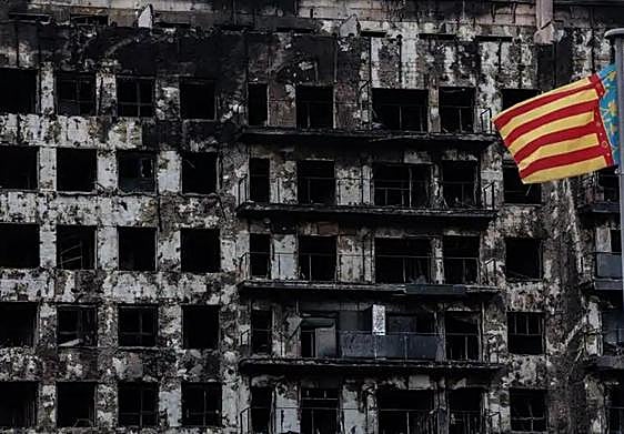 The burned-out blocks of flats.