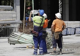 A group of workers on a building site in Malaga.