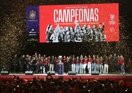 Spain's players and coaching staff celebrate their recent triumph in the inaugural Women's Nations League.
